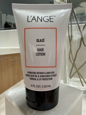 L'ANGE Glazé Hair Lotion - White Tube with Black Cap and Coral Accent